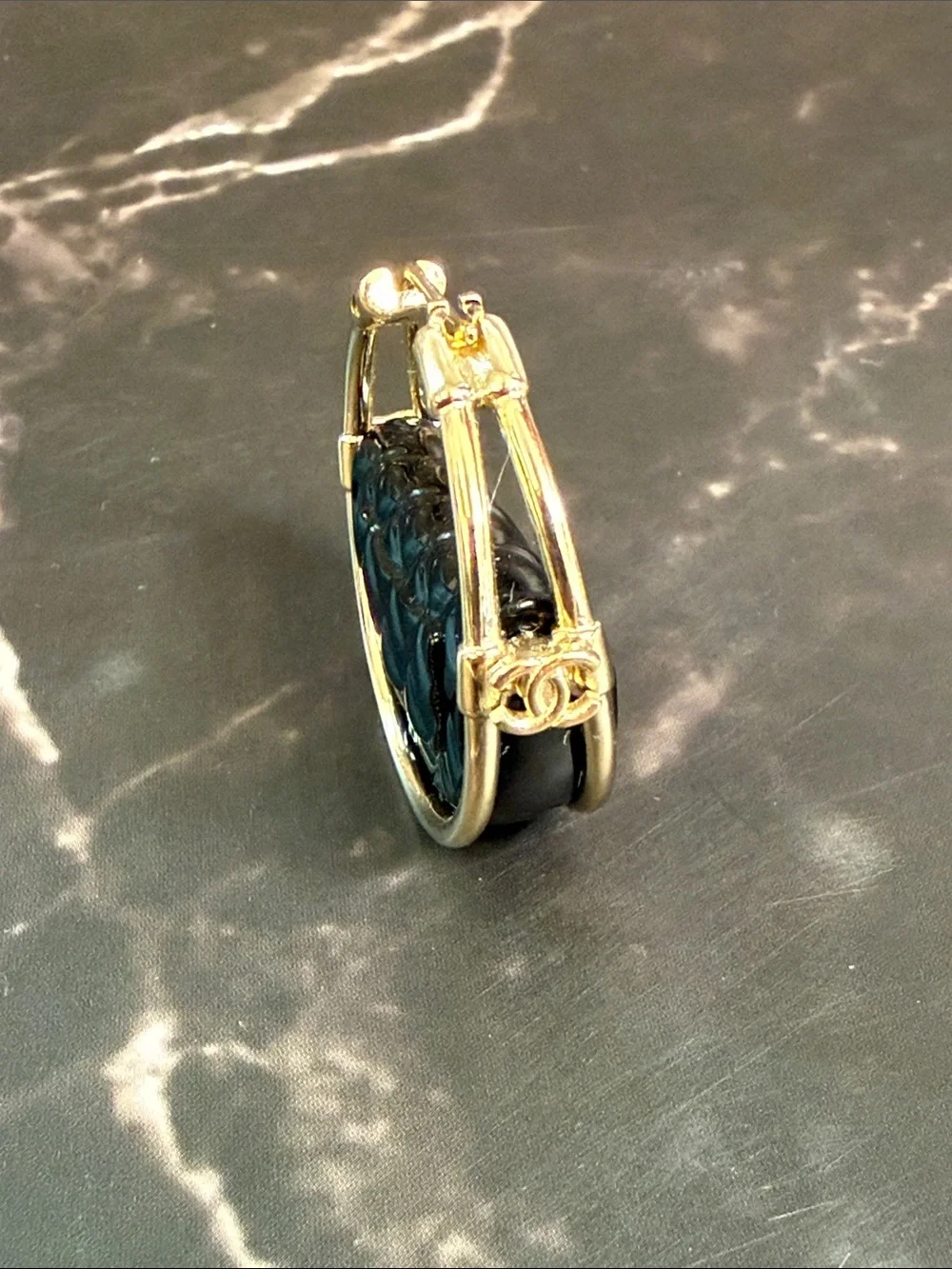 CHANEL Silver-Tone Hoops with Black Quilted Enamel CC Detail